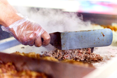 Pieces of steak being grilled at Dominic's of New York in Edwardsville, PA.