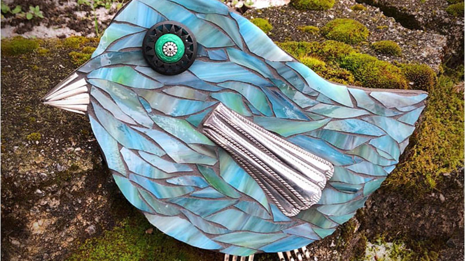 Stained glass spoon bird made with repurposed pieces at Fly Me Home in Pittston, PA.