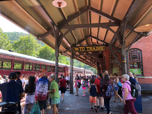 People waiting to board the Lehigh Gorge Scenic Railway’s Autumn Leaf Excursions in Jim Thorpe, PA.