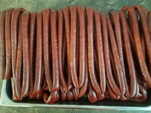 Rings of smoked kielbasi hang inside Plains Meat Market in Wilkes-Barre, PA.