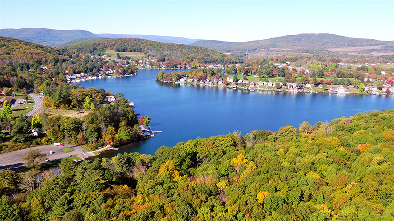 Aerial shot of fall foliage at Lake Winola in Lake Winola, PA.