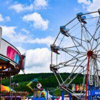A view of carnival rides including a carousel and a ferris wheel at the Lackawanna County Heritage Fair at Montage Mountain Resorts in Scranton, PA.