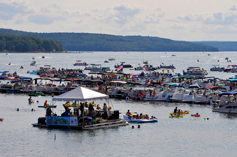 Boats gather around the floating stage on Lake Wallenpaupack during Wally Lake Fest in Hawley, PA.