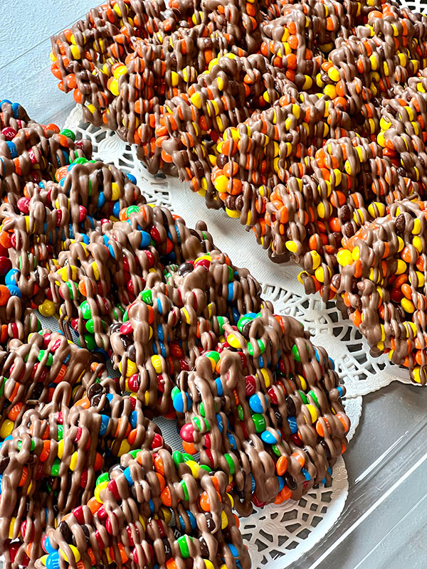 Hand-dipped chocolate covered pretzels covered in candy at Alle’s Chocolate Shoppe in Forty Fort, PA.