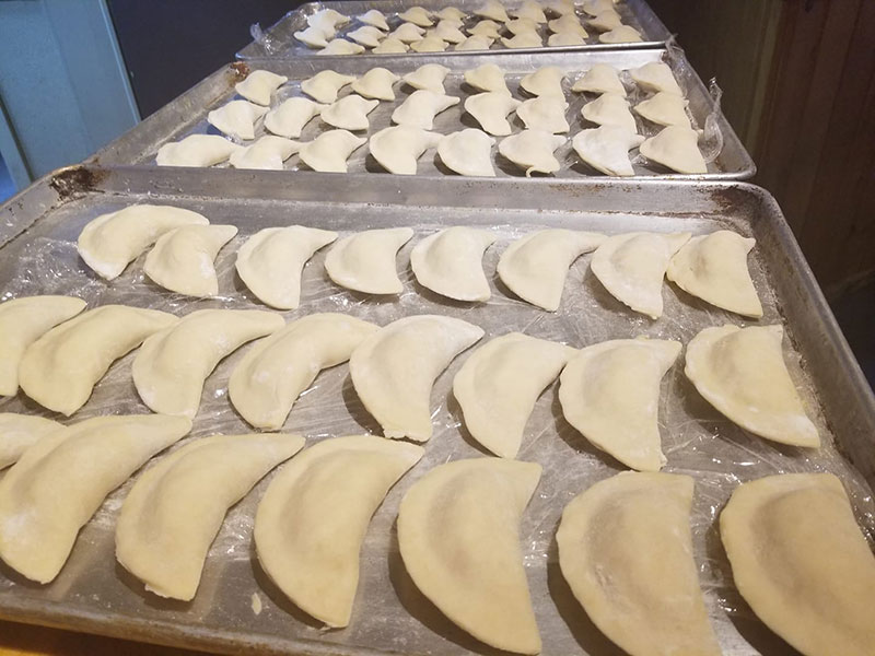 Freshly made pierogi in trays waiting to be cooked at The Waymart Deli in Waymart, PA.