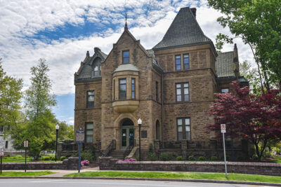 Kirby Hall, a tan and brown stone mansion in Wilkes-Barre, PA.