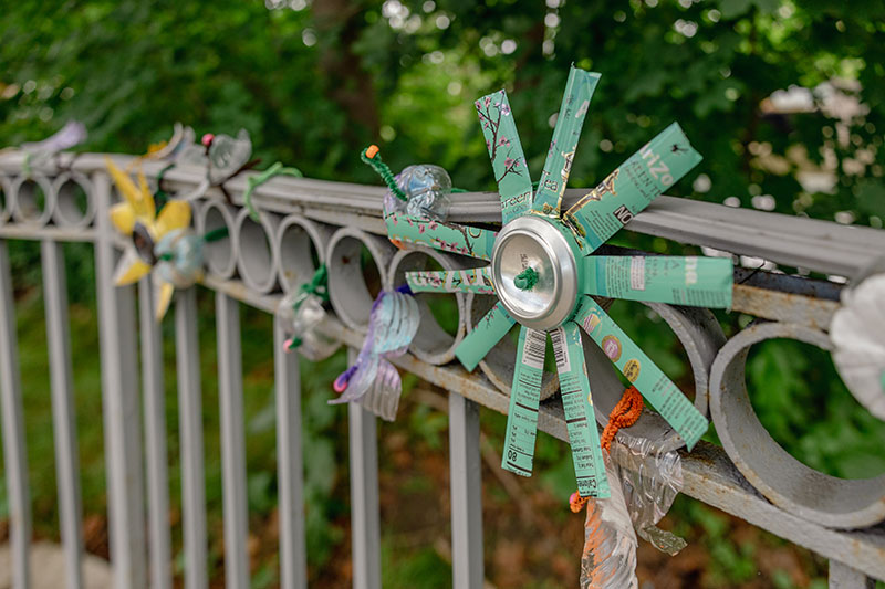 The Recycling Garden, with its creations adorning a metal fence, is located at Ann Street Park in Stroudsburg, PA.
