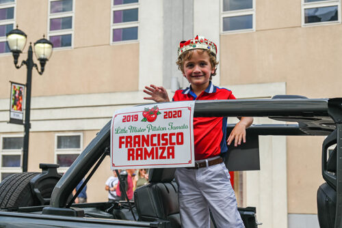 Mr. Tomato contest winner rides in a vehicle during the Pittston Tomato Festival in Pittston, PA.
