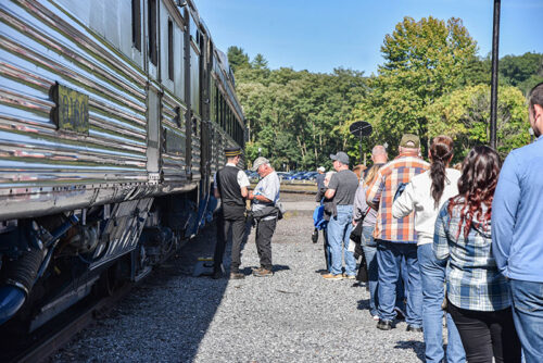 People lined up to board the Reading Blue Mountain & Northern Railroad in Pottsville, PA