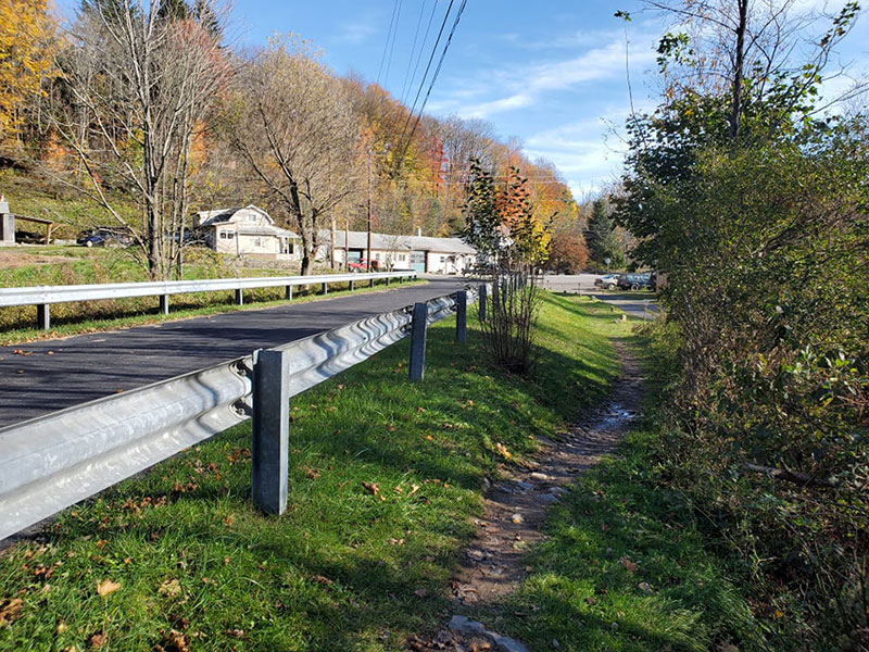 The North Pocono Trail System in Moscow, PA running parallel to a road.