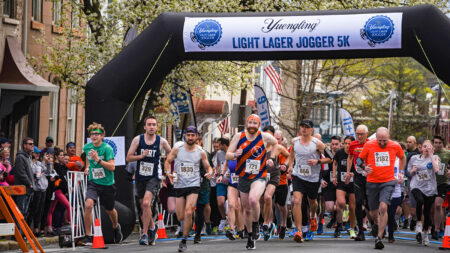 A photo of a cluster of runners at the start of the Yuengling Light Lager Jogger Race in Pottsville, PA.