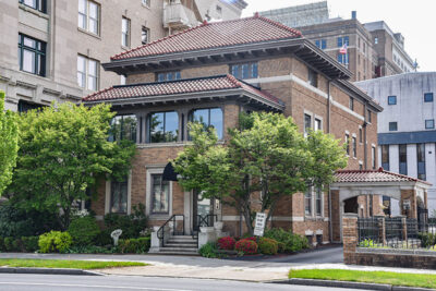 Chapman Hall, a brick mansion with a terracotta roof in Wilkes-Barre, PA.