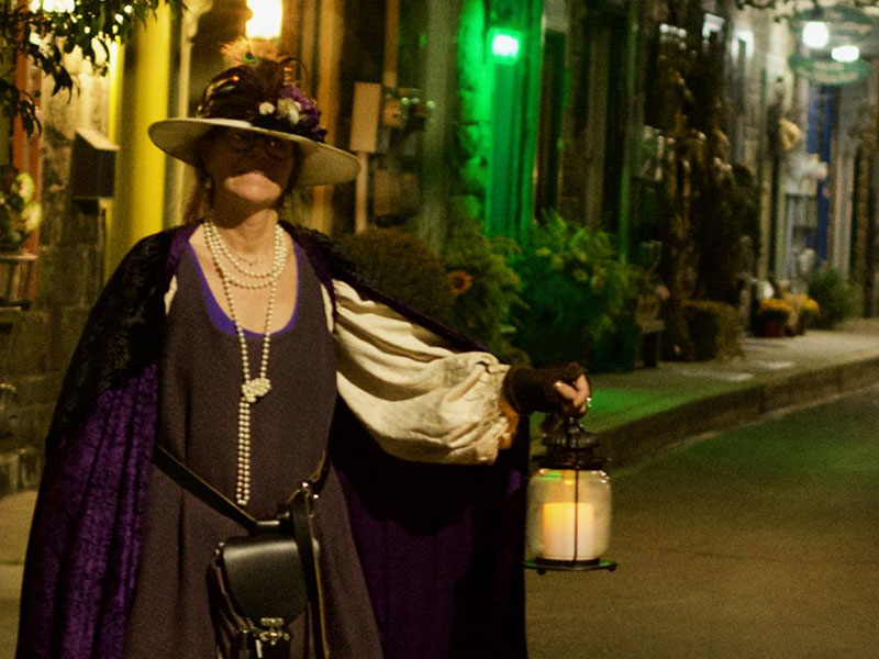Woman guiding the Ghost Walks in Old Mauch Chunk in Jim Thorpe, PA.