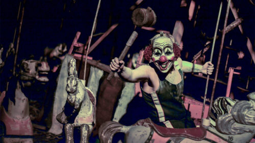 Creepy clown scaring patrons at Reapers Revenge, a Local Haunted House & Haunted Attraction in Scott Twp., PA.