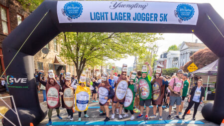 A group of runners, some dressed in beer costumes at the Yuengling Lager Jogger in Pottsville, PA.