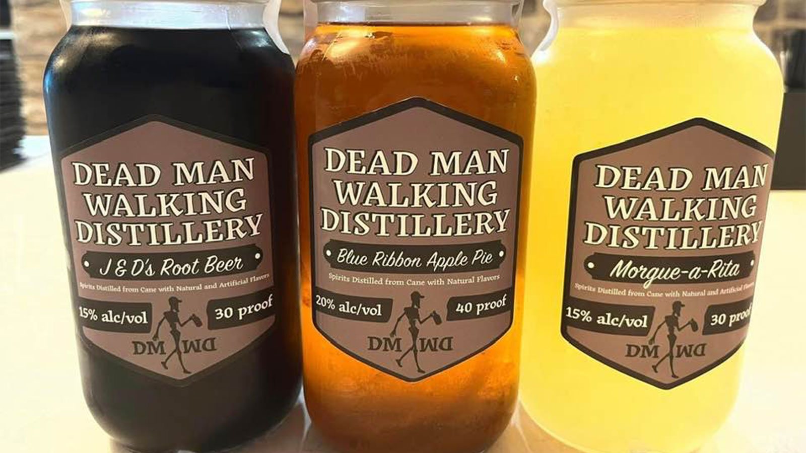 Three jars of moonshine at Dead Man Walking Distillery in Bloomsburg, PA.