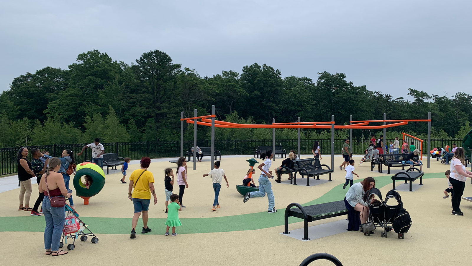 Families playing on the playground at City View Park in Hazleton, PA.