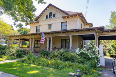 Looking at the expansive front porch of the Kitteridge House along the Historic Tunkhannock Walkikng Tour in Tunkhannock, PA.
