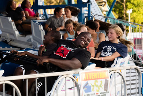 Fairgoers take a spin on a ride at the Luzerne County Fair in Dallas, PA.