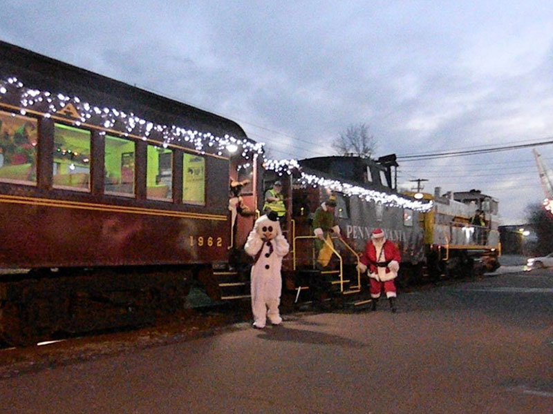 Train ride characters waiting outside the North Pole Express event in Bloomsburg, PA.