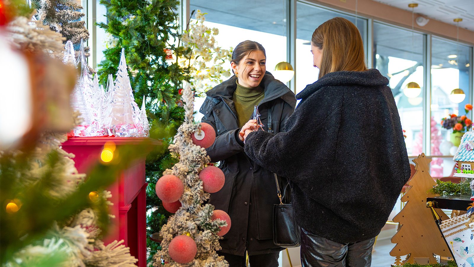 Two women shopping for Christmas gifts at Mattern's Floral Cafe in Kingston, PA.