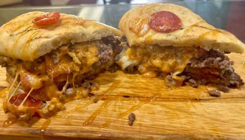 A cheesesteak with pepperoini slices on top of the bun from Franco's in Wilkes-Barre, PA.