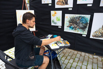 An artisan paints during the Fine Arts Fiesta in Wilkes-Barre, PA.