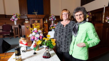 Kitty Jenkins Purosky and Doreen Woodyatt Fazzi are pictured on a church alter in Scranton, PA.