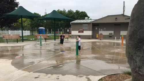 Two boys playing on the splash pad at Airport Park in Matamoras, PA.