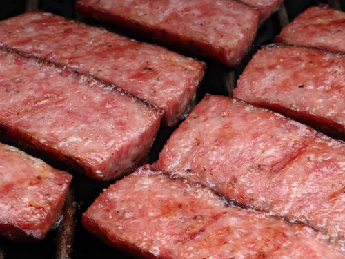 Kielbasi cooking on a grill at Leonard's Kielbasi Market in Wilkes-Barre, PA.