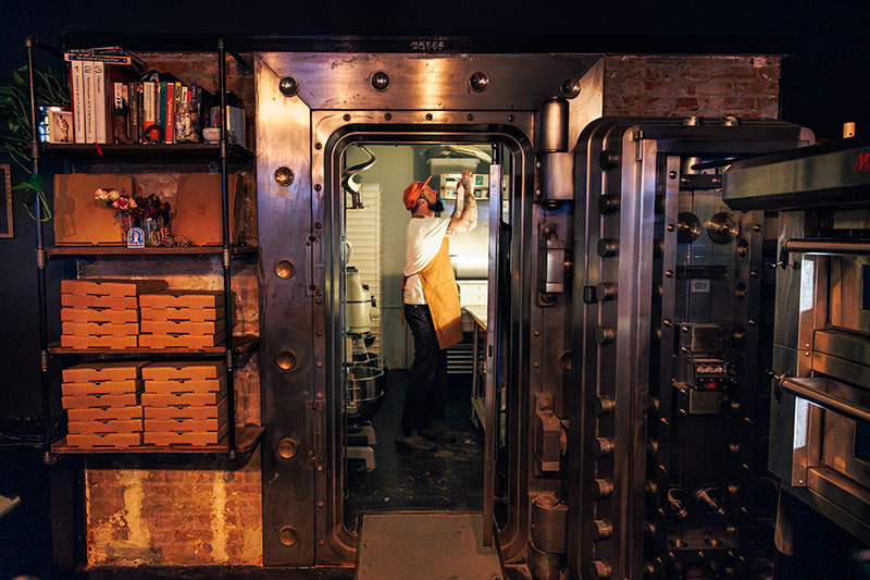 View of pizza being made in the kitchen at Pizza Althea in Pittston, PA.