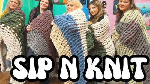 Five women wrapped up in their blankets that they knitted during their Sip N Knit class at The Art Party Place in Mountain Top, Pa.