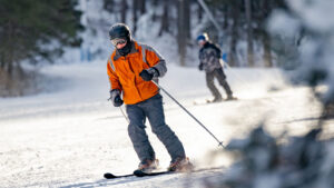 Image of two men skiing down the hill at Blue Mountain Resort in Palmerton, PA.