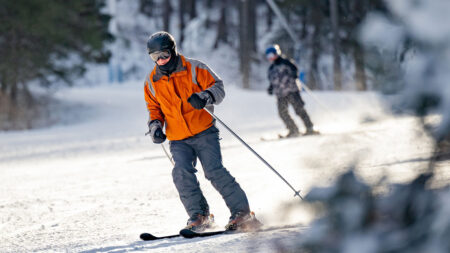 Image of two men skiing down the hill at Blue Mountain Resort in Palmerton, PA.