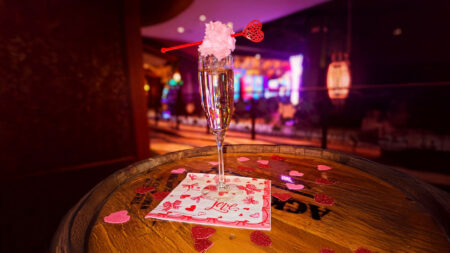 Glass of champagne on a Valentine's Day napkin at the Blush Lounge pop-up bar at Mohegan Pennsylvania casino in Wilkes-Barre, PA.