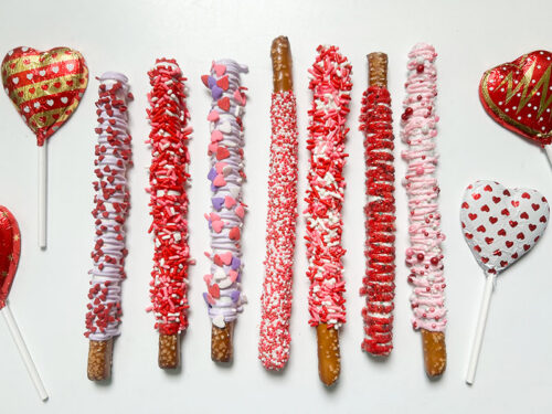 A collection of iced pretzel rods decorated for Valentine's Day from Alle's Chocolate Shoppe in Forty Fort, PA.