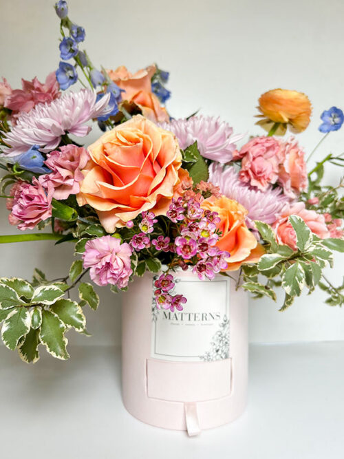 A peach and pink floral arrangement from Matterns in Kingston, PA.