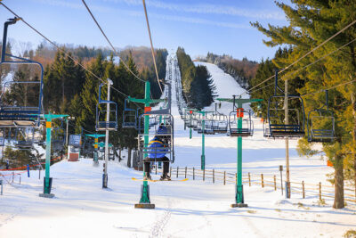 Point of view image from ski lift looking up the hill at Elk Mountain in Union Dale, PA.