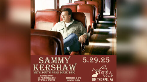 Sammy Kershaw sitting on a train for his performance at Penn's Peak at Jim Thorpe, PA.
