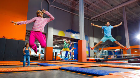 Kids bouncing on a trampoline at Sky Zone, and indoor family fun destination in Pittston, PA.