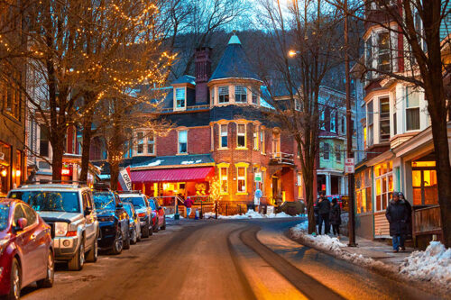 A twilight street view of Jim Thorpe Pennsylvania during Winterfest.