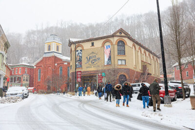 A snowy scene outside the Mauch Chunk Opera House during Winterfest in Jim Thorpe, PA