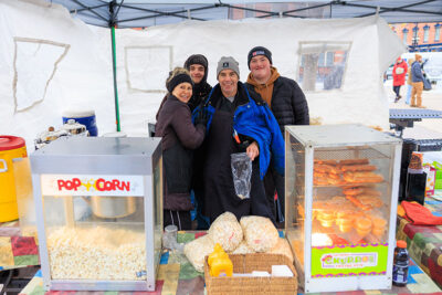 Vendors smile for the camera during Winterfest in Jim Thorpe, PA