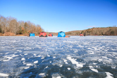 Ice fishing tents on top of the frozen lake during Nanticoke Conservation Club's Ice Fishing Derby at Frances Slocum State Park in Wyoming, PA.