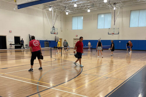 People playing indoor pickleball at the Friedman Jewish Community Center in Kingston, PA.