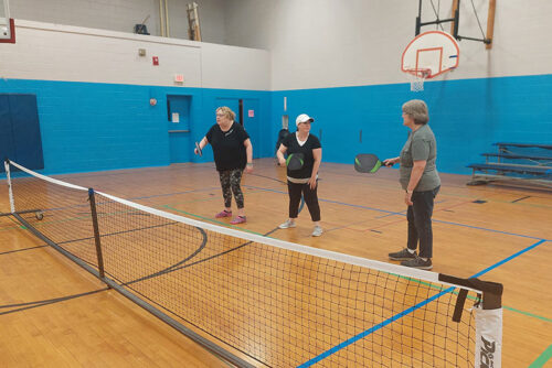 People playing indoor pickleball at the Greater Pittston YMCA in Pittston, PA.