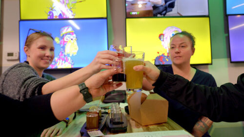 Patrons raise their pints and cheers while enjoying lunch at Mutant Brewing in Scranton, PA.