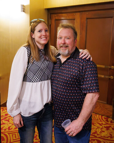 A man and woman pose for a photo inside the F.M. Kirby Center for the Performing Arts in Wilkes-Barre, P.A.