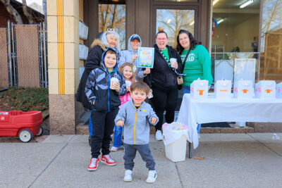 A group of people pose for the camera at the second annual St. Patrick's Day Parade in Nanticoke, PA.