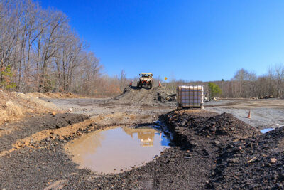 An off-road vehicle about to splash through a muddy puddle at Pocono Outdoor Adventure Tours in Long Pond, PA.